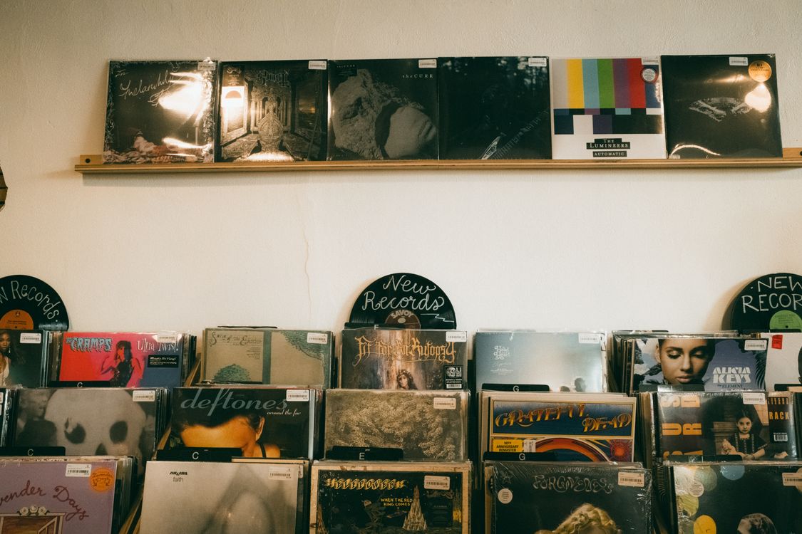 Warm vintage record shop interior with vinyl records on display