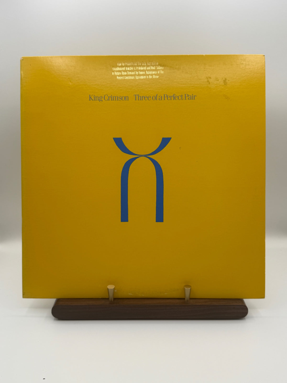 King Crimson Three Of A Perfect Pair 1984 US Allied pressing front cover gold promotional stamp