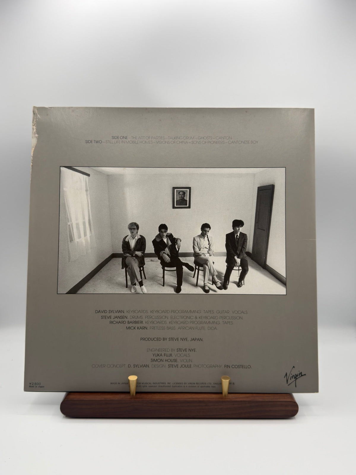 Japan Tin Drum VIP-6984 rear sleeve showing tearing and paper loss at the upper left edge